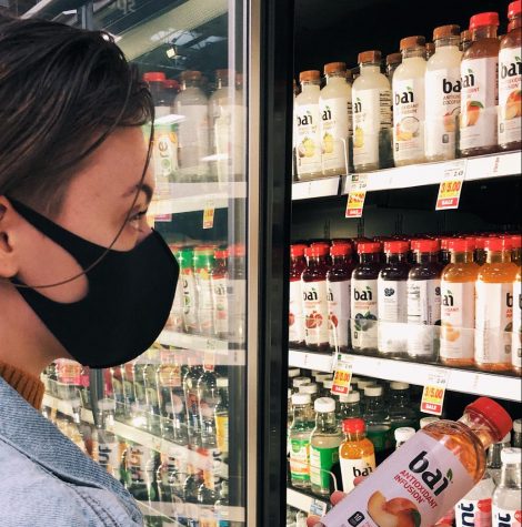 Senior Emma J Nelson reps a light weight cloth mask on a trip to the grocery store. Her family began stocking up on both store bought and handmade facial coverings as soon as COVID-19 presented itself in Oregon. Photo by Gillian Nelson.
