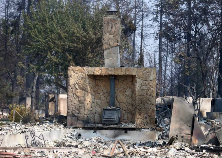 Porter’s mother returned to the site of her home in Phoenix, Ore., to find only the chimney remained standing. The house was a total loss.