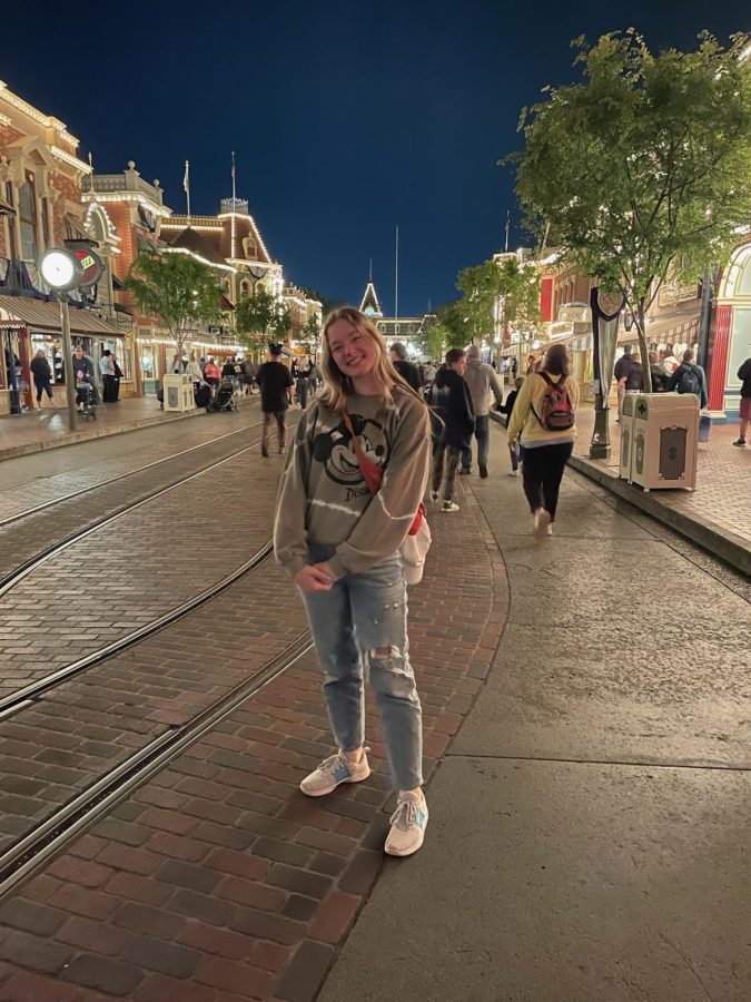 Photograph of Senior Grace Metler visiting Disneyland in California by Rob Metler.