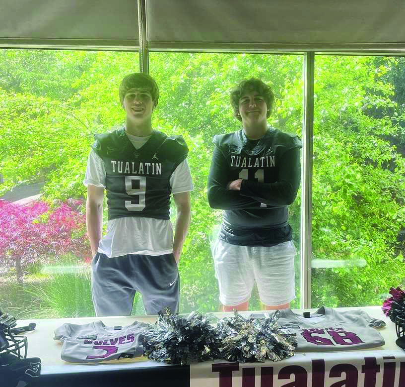 Seniors Jack Wagner and Richie Anderson visit Hazelbrook Middle School to represent Tualatin football. Next year, Wagner will be playing at University of Idaho, and Anderson will be playing at Fresno State. Photo courtesy of @tualatinfootball.