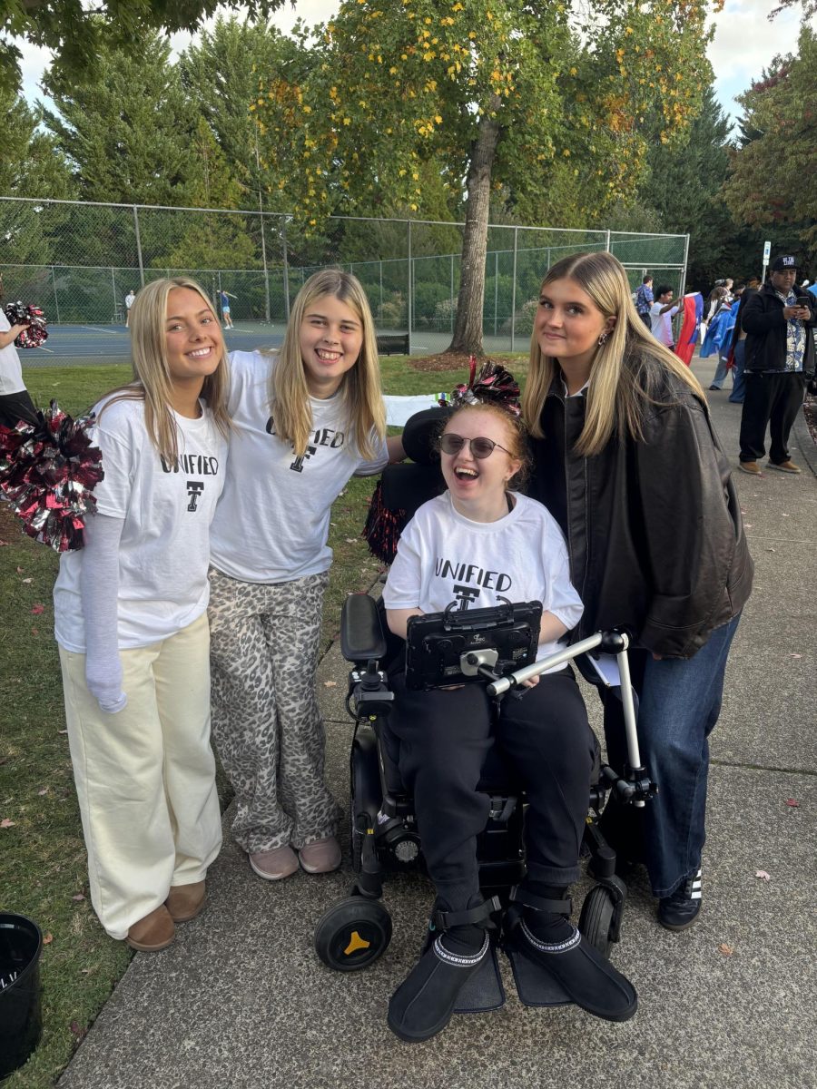 Piper Findtner, Sophie Flicker, Sydney Kirchner and Layla Madrid, juniors in Unified Club, showed their spirit at the 2025 Homecoming Parade.
