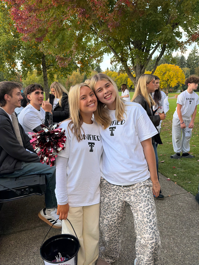 Juniors Sophie Flicker and Piper Findtner represented Unified last fall at the Homecoming Parade.